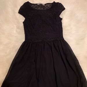 Black dress , goes alittle bit above the knees